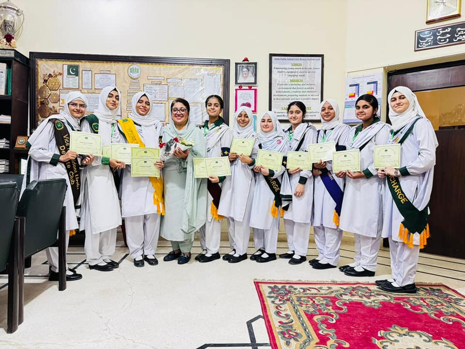 Library shelves and student reading